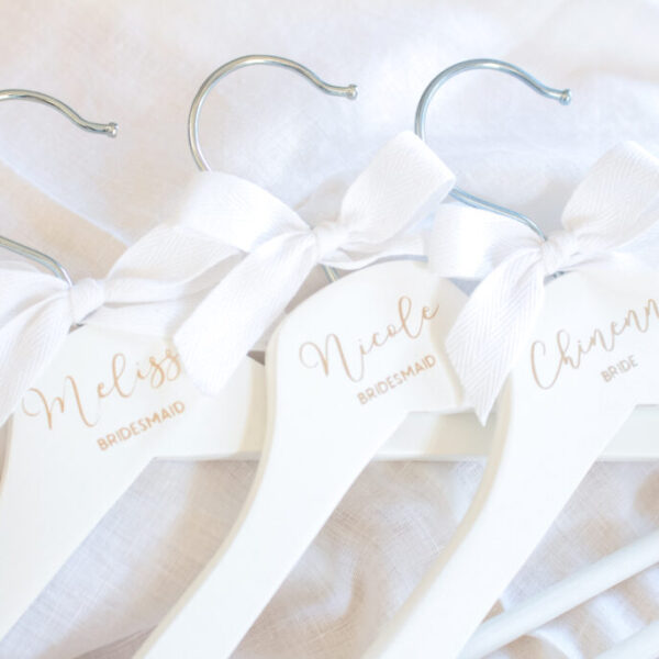 Celebrate beautiful moments with these bridal party hangers.